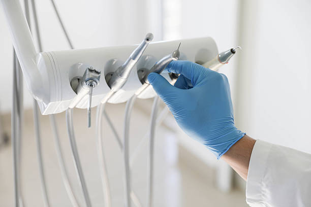 Professional Invisalign Clear Aligners technician working in Flushing, MI